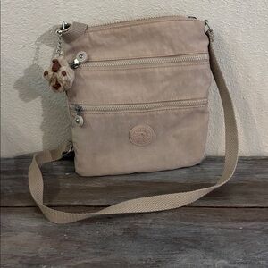 Excellent condition Kipling Crossbody or adjustable shoulder strap bag charm